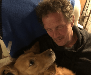 Monty Don on the sofa with his dog