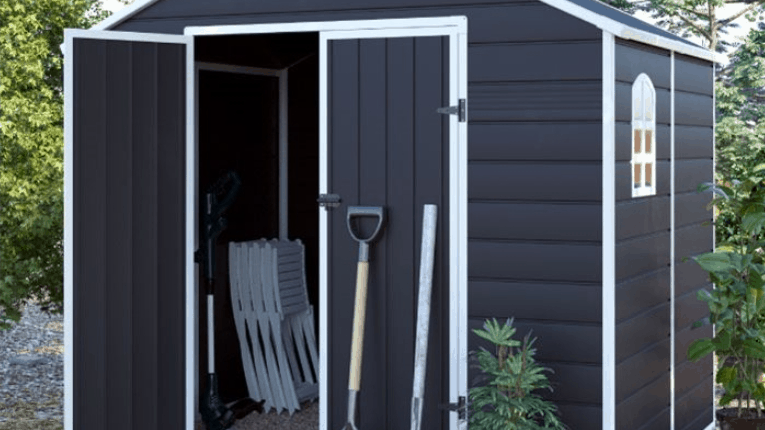 BillyOh Ashford Apex Plastic Shed in black uPVC with white trim and garden tools leant up against it
